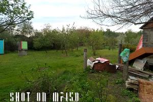 участок по адресу Мельниківська