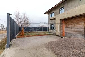будинок за адресою Набережний
