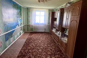 будинок за адресою Коновальця
