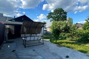 будинок за адресою Євгена Коновальця вул. (Гліба Успенського), 45