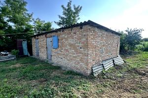 будинок за адресою Коновальця