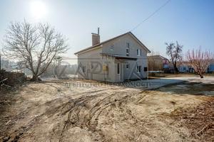 дом по адресу Великі Дмитровичі