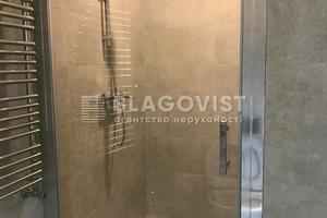 комерційна за адресою Євгена Коновальця вул. (Щорса), 26-А