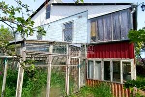 дом по адресу с. Шевченково, 9 травня