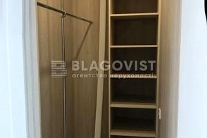 комерційна за адресою Євгена Коновальця вул. (Щорса), 26-А