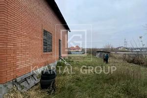 участок по адресу Грушевського