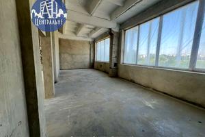 комерційна за адресою Комунальників вул., 2