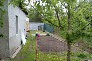 участок по адресу Мельниківська