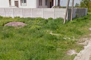 участок по адресу Сухомлинського, 54