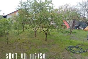 участок по адресу Мельниківська