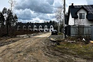 участок по адресу Ольжича