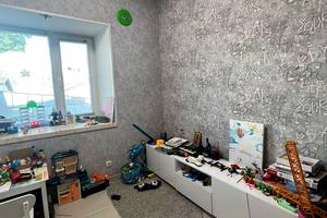 будинок за адресою Євгена Коновальця вул. (Гліба Успенського), 45