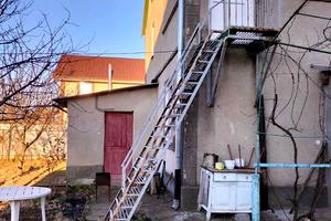 будинок за адресою смт. Великодолинське, Маріїнська вул.