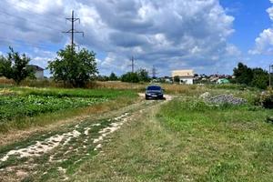 участок по адресу Лучанська
