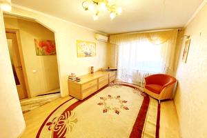 квартира по адресу Строителей ул., 18