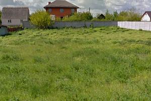 участок по адресу Сухомлинського, 54