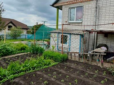 будинок за адресою с. Сурсько-Литовське, центральна