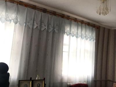будинок за адресою с. Кузьмин, Центральна, 23