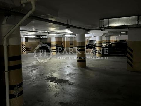 паркомісце за адресою Євгена Коновальця вул. (Щорса), 36-В