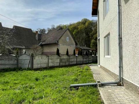 будинок за адресою Коновальця