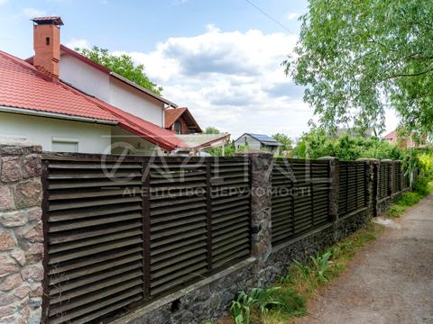будинок за адресою 124-а Садова