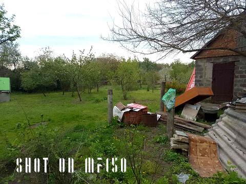 участок по адресу Мельниківська