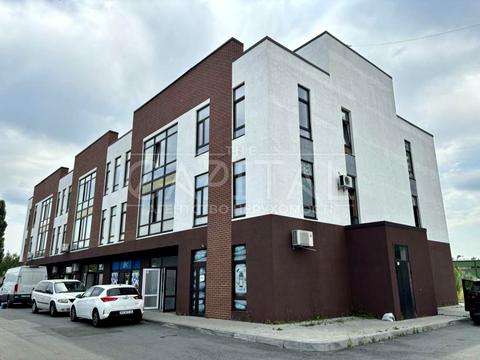 комерційна за адресою Братиславська вул., 52-Б