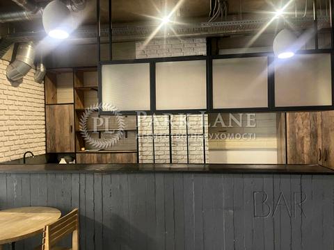 комерційна за адресою Євгена Коновальця вул. (Щорса), 12