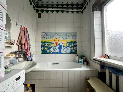 будинок за адресою Євгена Попова