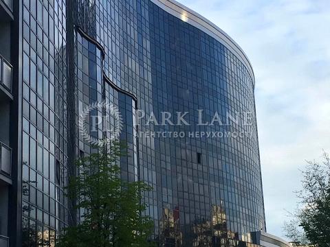 комерційна за адресою Євгена Коновальця вул. (Щорса), 12