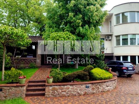 дом по адресу 50-та Садова ул., 128