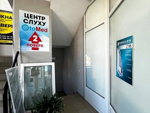 комерційна за адресою Жовтнева вул., 7