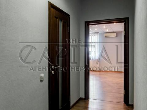 комерційна за адресою Євгена Коновальця вул. (Щорса), 32-А