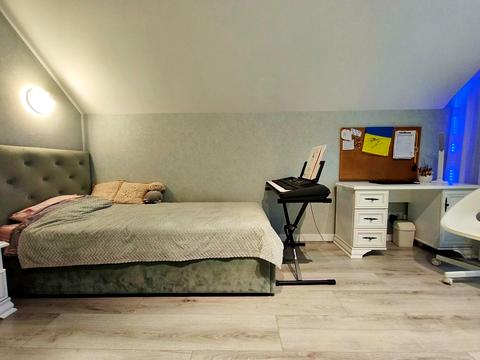 дом по адресу Коновальця