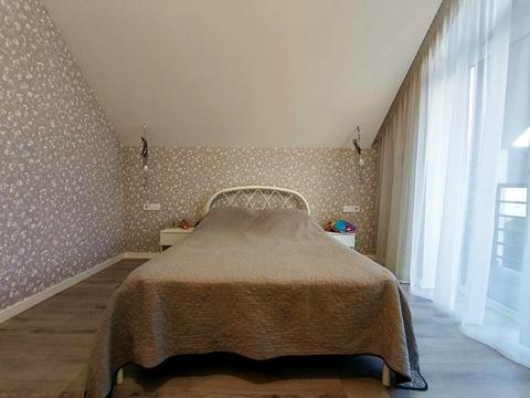 дом по адресу Коновальця