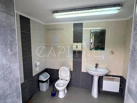 комерційна за адресою Пухівська вул., 15