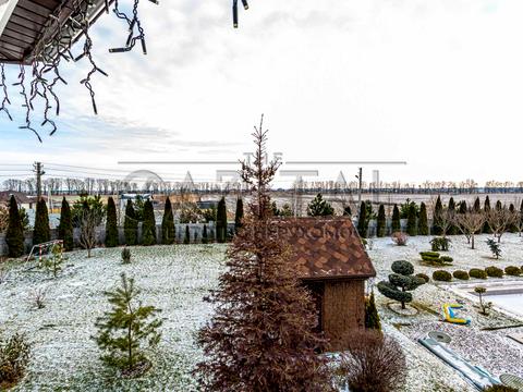 дом по адресу с. Безугловка, Набережная ул., 1