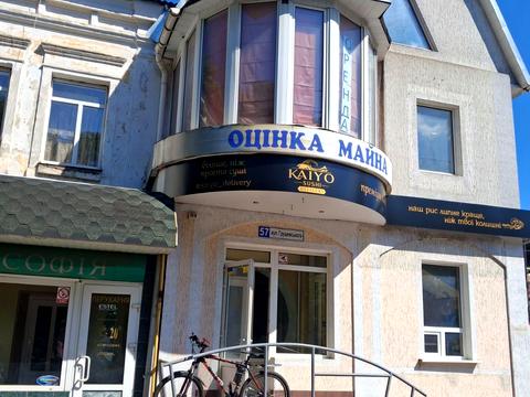 комерційна за адресою Грушевського вул., 57