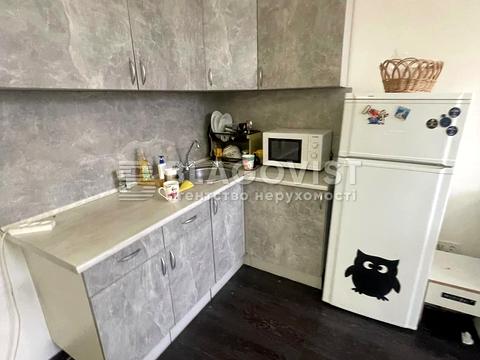 комерційна за адресою Миколи Міхновського бульв. (Дружби Народів), 13