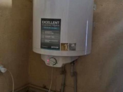 будинок за адресою с. Пухівка, Микала