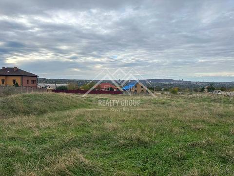 участок по адресу Милены Рудницкой ул. (50-летия Победы), 9