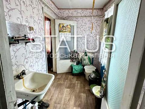 будинок за адресою с. Човно-Федорівка, Миру