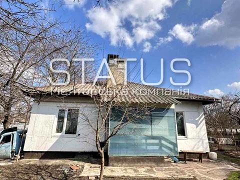 будинок за адресою с. Човно-Федорівка, Миру