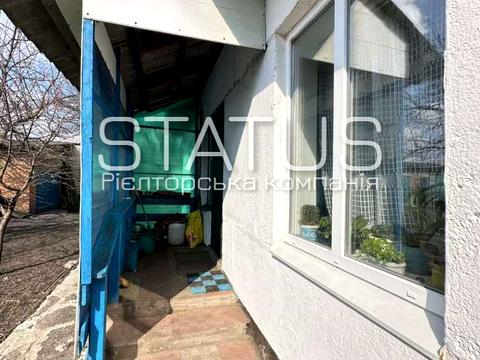 будинок за адресою с. Човно-Федорівка, Миру