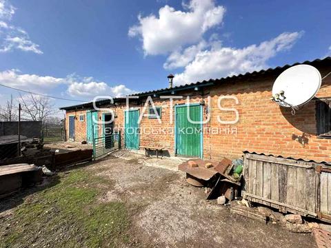 будинок за адресою с. Човно-Федорівка, Миру