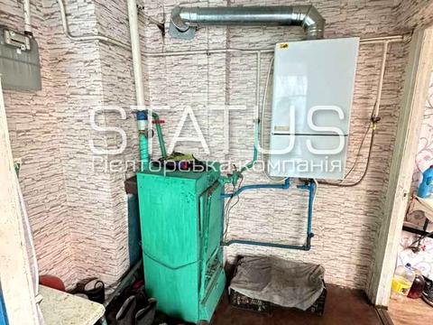 будинок за адресою с. Човно-Федорівка, Миру