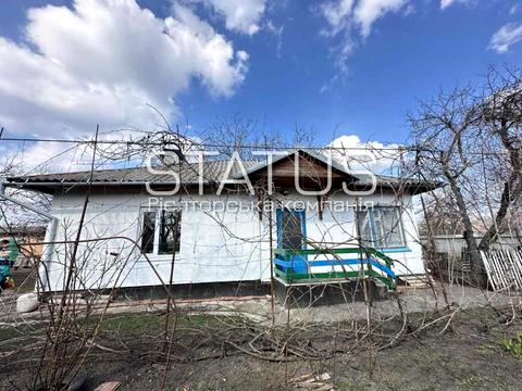 будинок за адресою с. Човно-Федорівка, Миру