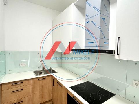 комерційна за адресою Оксамитова вул., 9-А