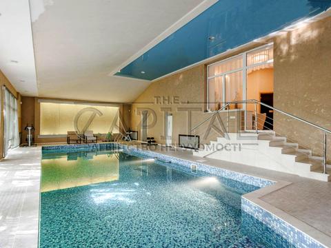 дом по адресу Бучанський