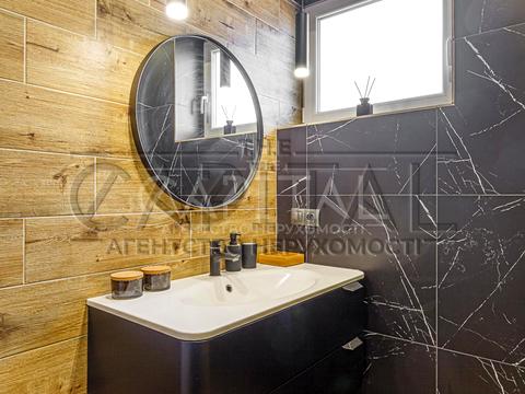 будинок за адресою с. Крюківщина, Георгія Мальцева, 1